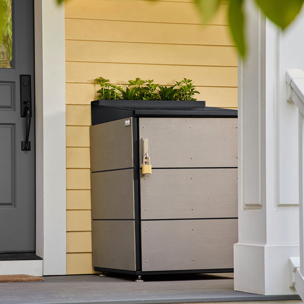 Modern trash enclosures and package lockers. Rats hate us.